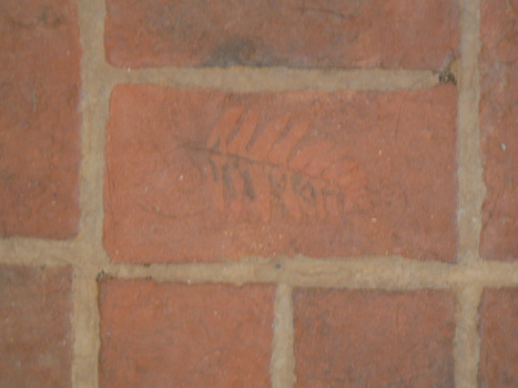 Custom thin brick floor tile with plant imprint